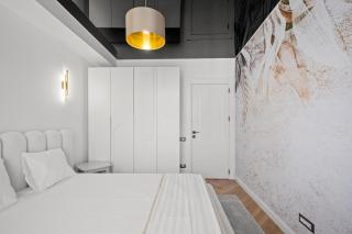 Modern Luxury Retreat with Private Balcony by Blvd - 4
