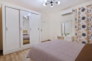Sunny 2BR Apartment in Madinaty - 6