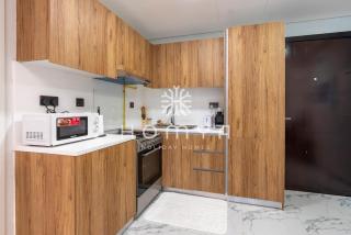 Comfortable 1BR Apartment with Relaxing Pool View - 5