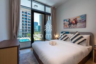 Comfortable 1BR Apartment with Relaxing Pool View - 1