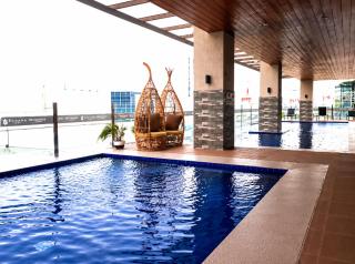Deluxe Twin Units by MIGAs Haven at Sunvida SM City - 9