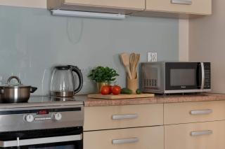 Spacious Apartment with a Balcony and Parking by Noclegi Renters - 1