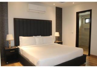The Charcoal Suite Stylish 2BR at Opus - 8