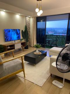 serene stays apartment with fully equipped gym , heated swimming pool ,private parking space and amazing scenic views - 6