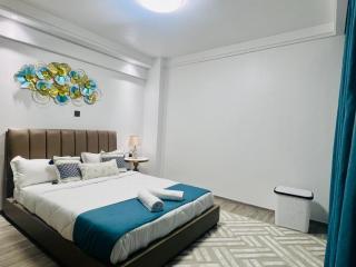 serenity heights two bedroom apartment with swimming pool fully equipped gym ample parking space child play area and amazing scenic views - 8