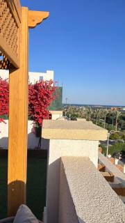 1 bedroom with private rooftop in sharm hills aqua - 4