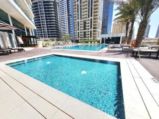 SUNRISE HOMES - A Stylish Studio in Botanica Tower - 2