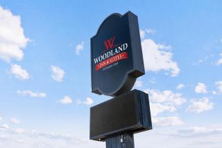 Woodland Inn and Suites Extended Stay - 8