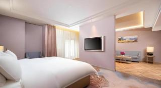 Vienna Hotel Lincang New Asia Pacific Times Square - 5