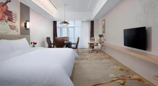 Vienna Hotel Anhui Taihe Baitai Xingma International - 4