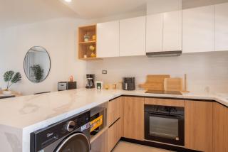 Born | Modern 2BR with Pools and Gym - 3