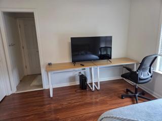 Room 3 with full size bed and 50" 4K TV in Grayson - 1