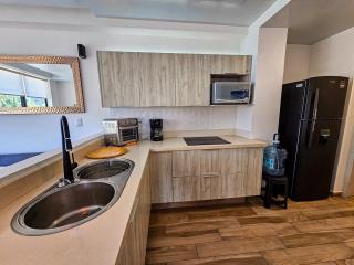 Macondo 1BR Rooftop Pool, Parking & Wi-Fi - 8