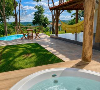 Casa com Jacuzzi Charme Corumbá - 1