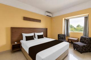 Hotel O near RSUD Arifin Achmad formerly Damon Butik Hotel - 9