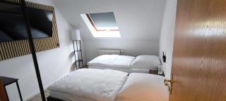 Zwei komfortable Zweibettzimmer mit Gemeinschaftsbad & Gemeinschaftsküche - 6
