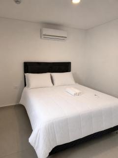 Bello y Cómodo Apartamento con Vista a la Playa en Edificio Vivo Costanera con Parking - 1