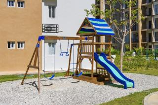 Luxury 2BR with Resort Pool, Balcony Swings, High-Speed WiFi & Near PUJ Airport - 8