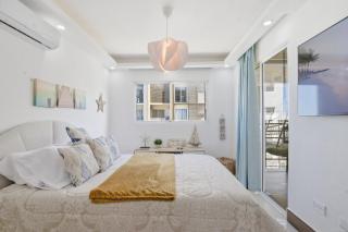 Luxury 2BR with Resort Pool, Balcony Swings, High-Speed WiFi & Near PUJ Airport - 1