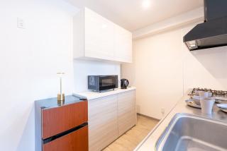 Spacious 60m2 new building Sleeps 7 Free parking 7 minutes from the airport International Avenue within walking distance 5 rooms can be rented privately in the building Room 302 - 0
