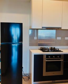 The Signature Suites at Cinnamon life Apartment - 6