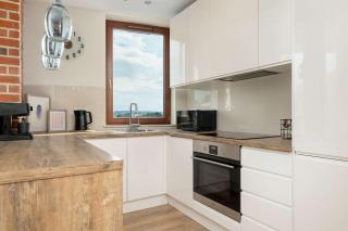 Family Apartment with Balcony and Underground Parking in Cracow by Noclegi Renters - 1