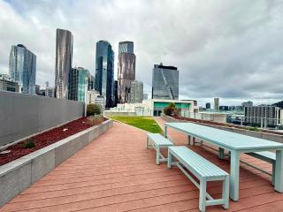 Compact Stay with Balcony, Rooftop & Gym - 6