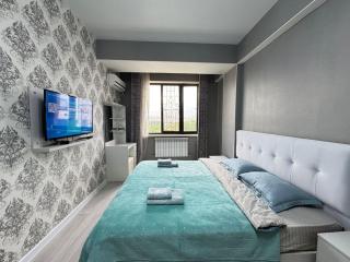 One bedroom and a guest room in residential building Panfilov - 0