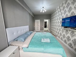 One bedroom and a guest room in residential building Panfilov - 7