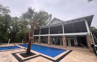 Impeccable Lakefront Luxury with Heated Pool, Hot Tub, Private Dock, Game room, Firepit & Sun Set in Amazing Location - 4