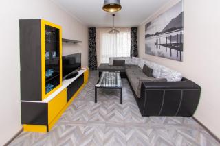 Black and Yellow apartment - 0