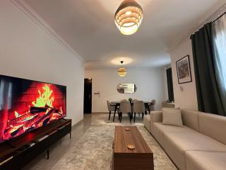 New, Stylish & Easy Access 2-BR Apartment in Janna New Cairo - 1