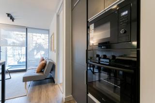 Modern 1BR Flat in Prime Location Ricardo Lyon - 2