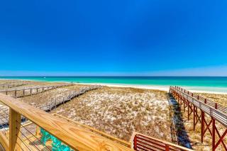 Three-Story Beachfront Gem with a Private Balcony Ocean View & Full Kitchen - 0