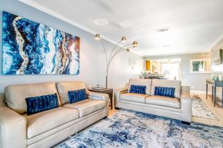 Two-story townhome near the beach with WiFi 3 balconies & HEATED pool - 0