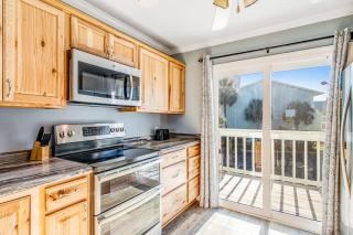 Two-story townhome near the beach with WiFi 3 balconies & HEATED pool - 1