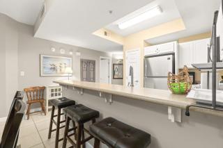 7th Floor Lovely Condo with Outdoor Pool Heated Seasonally On The Beach - 1