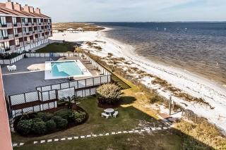 Inviting condo with bay & ocean views & pool - steps to the beach - 0