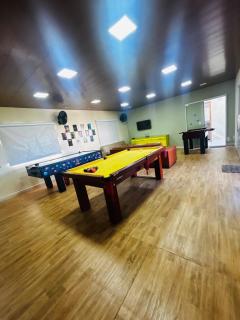 Casa de Praia com piscina, churrasqueira, fogão a lenha, espaço kids e sala de jogos - 1