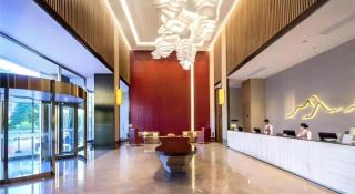 Echeng Hotel Laibing Jinxiu Shuidian Tower - 9