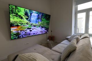 Downtown Condo w Huge TV - 9