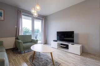 Sunny Apartment with a Balcony & Parking Close to the Beach by Noclegi Renters - 2