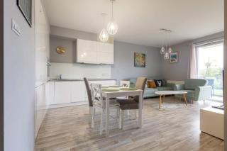 Sunny Apartment with a Balcony & Parking Close to the Beach by Noclegi Renters - 1