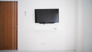 Best Choice and Homey 2BR at Puncak Dharmahusada Apartment By Travelio - 4