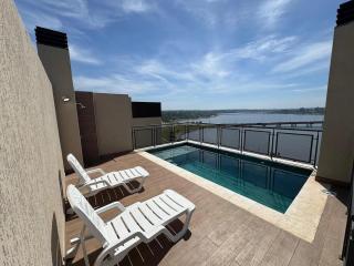 Moderno departamento con piscina con vista al río - 7