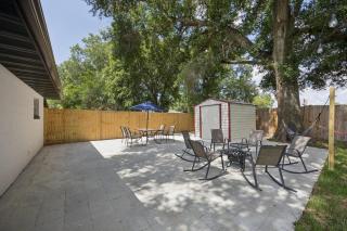 Modern Fully Furnished 3BR 2BA Orlando Home Near UCF Downtown Hospitals Disney and MCO with Free WiFi Garage Private Backyard Perfect for Families Business Travelers Vacation and Extended Stays - 1