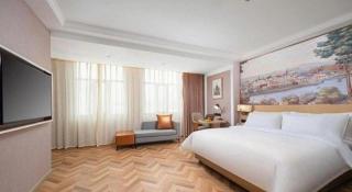 Vienna Hotel Lincang New Asia Pacific Times Square - 7