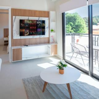 Two-Bedroom Quiet Stay with Rooftop Pool and Coworking - 9