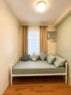 Fully Furnished 2BR Condo at Seawind With Netflix, Fast Wi-Fi, Near Airport and & Samal Island Ferry - Davao City - 4