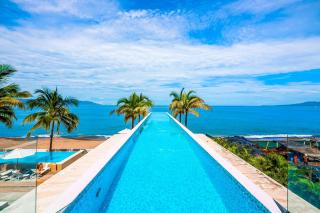 Luxury oceanfront apartment with private balcony, rooftop pool & gym access - 9